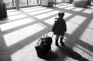 child traveling alone